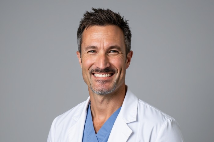 Dr. Alex Caillat headshot